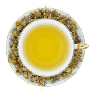 Calmomile Herbal Tea in a white and gold vintage teacup and saucer